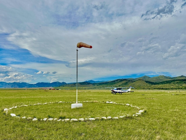 view of property's community featuring a mountain view and a rural view