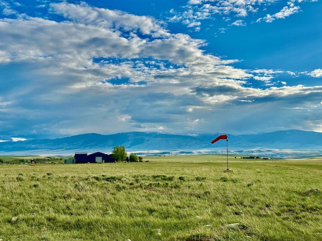 property view of mountains featuring a rural view