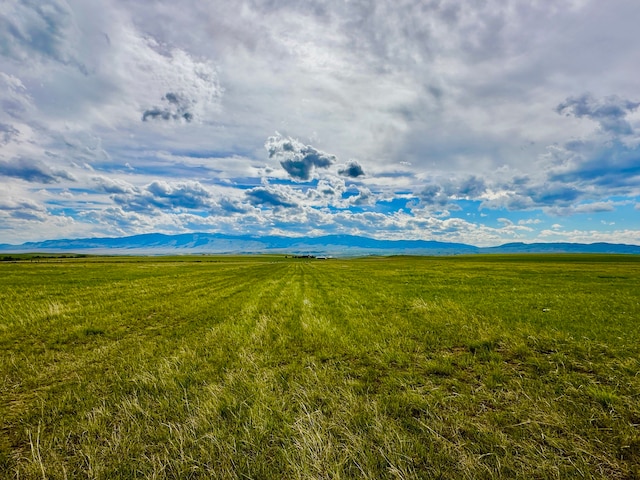 mountain view featuring a rural view