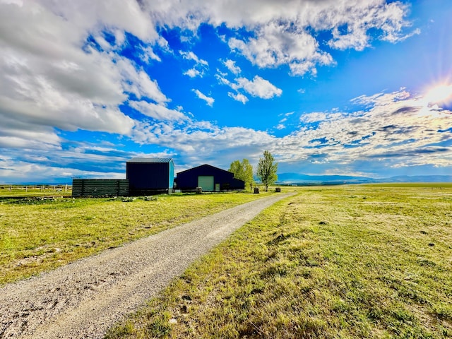 view of street featuring a rural view