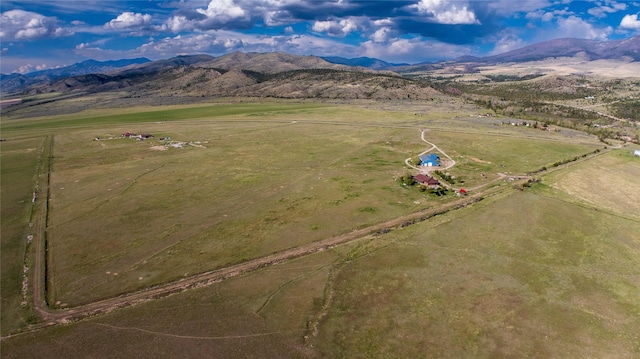 bird's eye view with a rural view and a mountain view