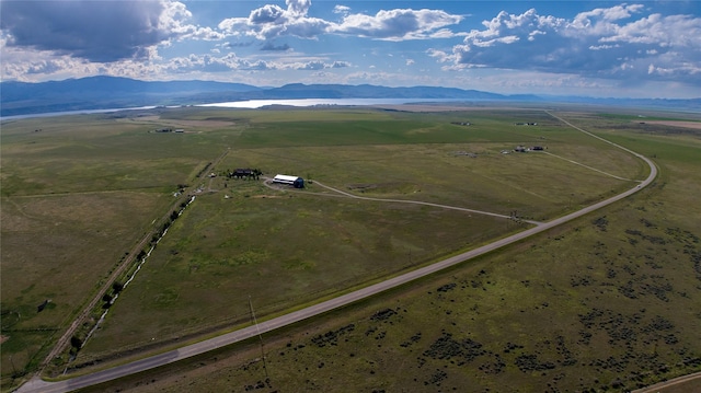birds eye view of property featuring a rural view and a mountain view