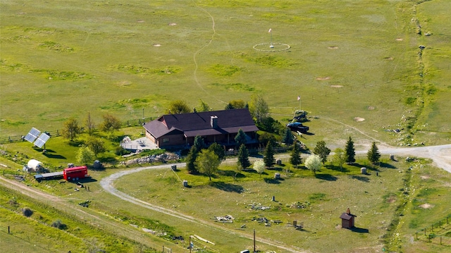birds eye view of property with a rural view