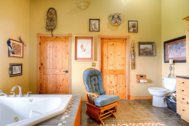 bathroom with tiled tub, toilet, and tile floors