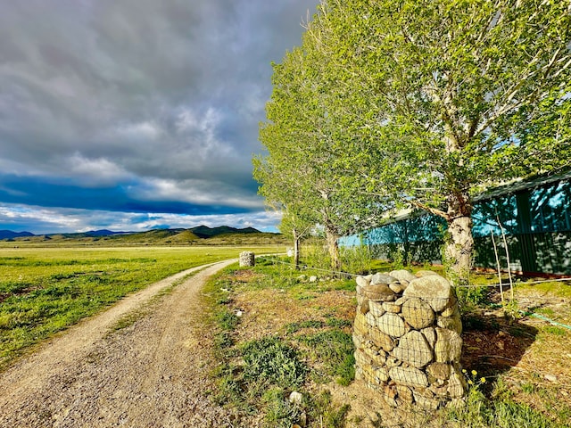 exterior space with a rural view