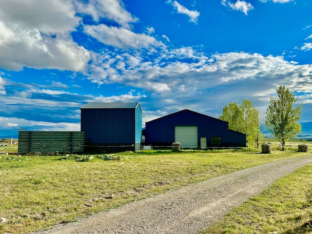 view of shed / structure with a yard