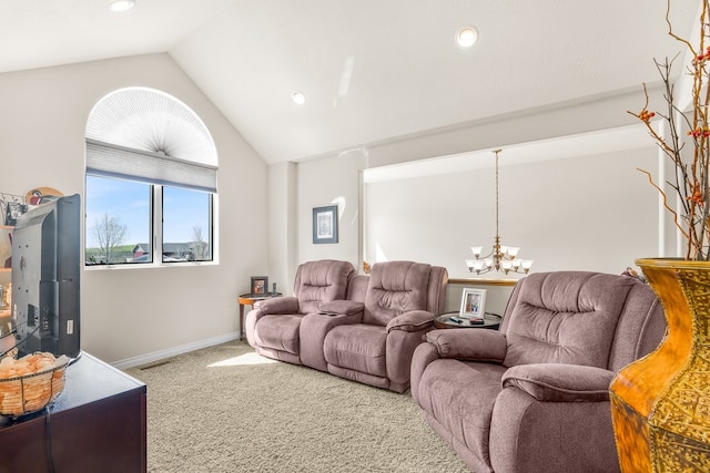 living room with carpet, vaulted ceiling, and a chandelier