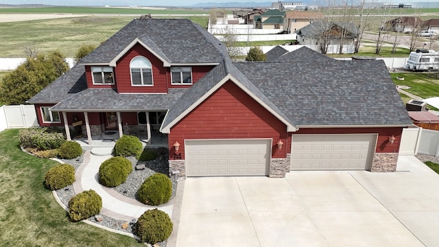 view of front facade with a front lawn and a garage