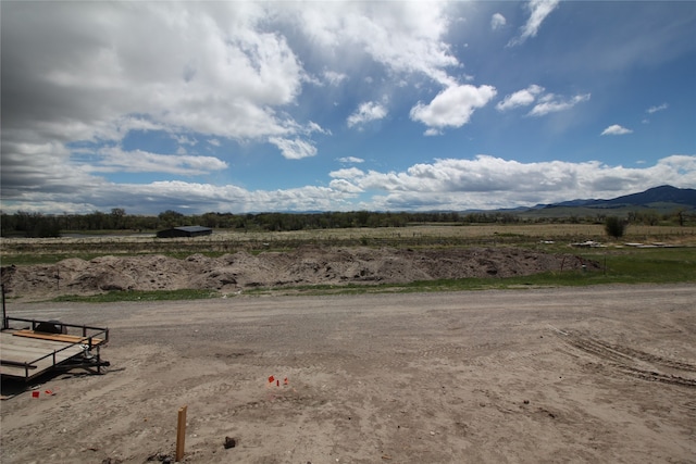 view of mountain feature featuring a rural view