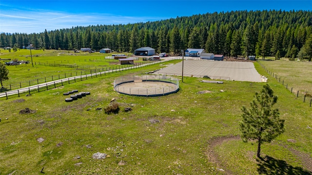 birds eye view of property featuring a rural view