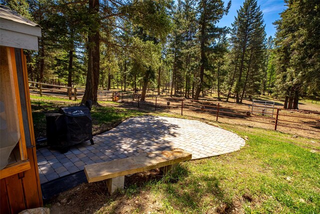 1200 Lost Creek Dr, Kalispell, MT 59901 - fenced backyard featuring a patio area