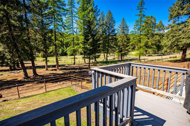 1200 Lost Creek Dr, Kalispell, MT 59901 - wooden deck featuring view of scattered trees