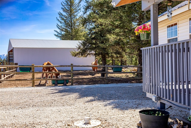 view of yard with an exterior structure and an outdoor structure