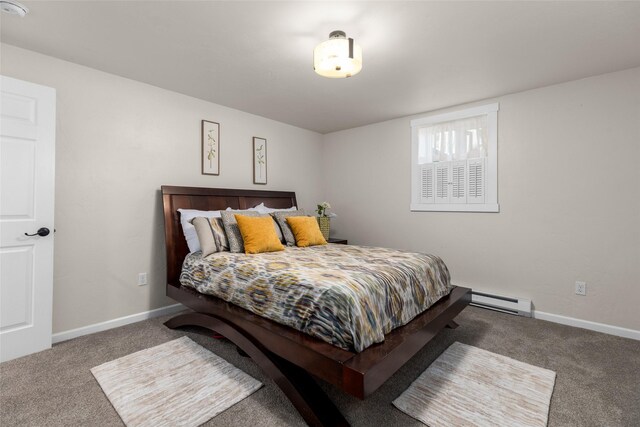 bedroom featuring carpet flooring and a baseboard radiator