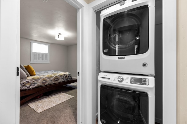 1200 Lost Creek Dr, Kalispell, MT 59901 - washroom with stacked washer / drying machine and carpet flooring
