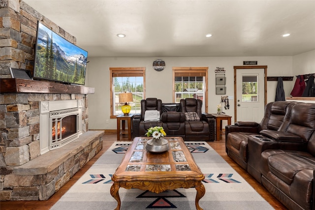 1200 Lost Creek Dr, Kalispell, MT 59901 - living area with wood finished floors, a fireplace, and recessed lighting