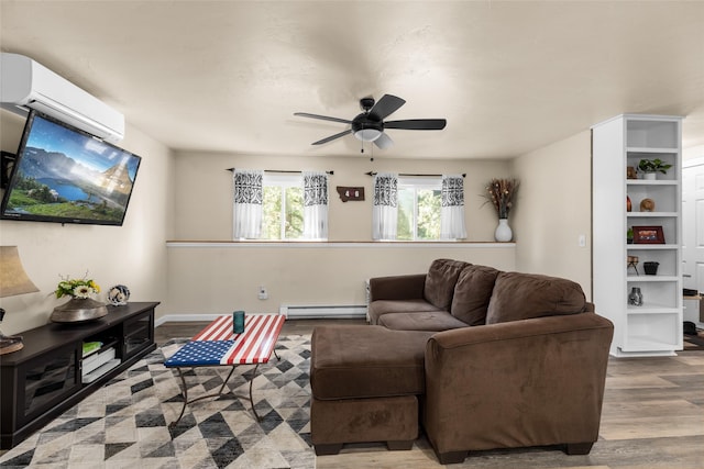 1200 Lost Creek Dr, Kalispell, MT 59901 - living area with a baseboard heating unit, a wall mounted air conditioner, wood finished floors, and ceiling fan