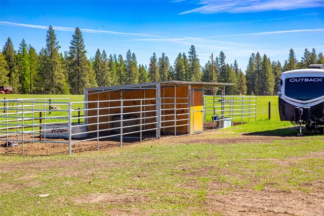 view of outbuilding featuring a rural view