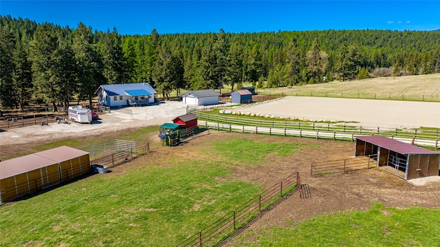 bird's eye view with a rural view and a forest view