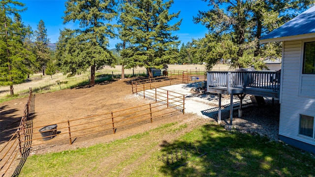 view of yard with a wooden deck