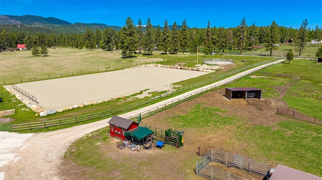 bird's eye view with a mountain view and a rural view