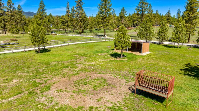 1200 Lost Creek Dr, Kalispell, MT 59901 - view of yard featuring view of wooded area