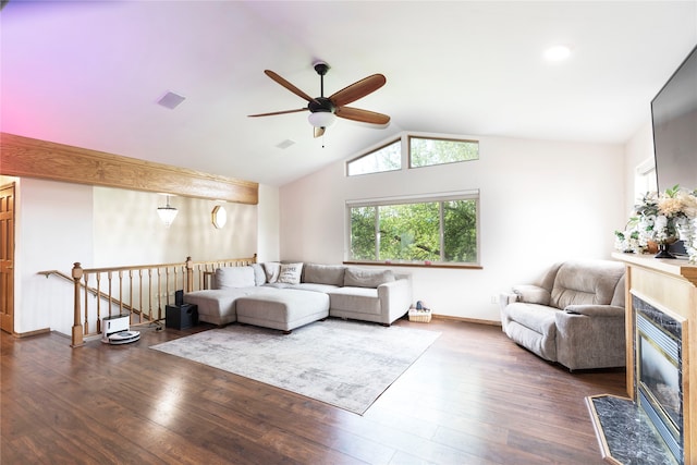 living room featuring a high end fireplace, ceiling fan, dark hardwood / wood-style flooring, and lofted ceiling