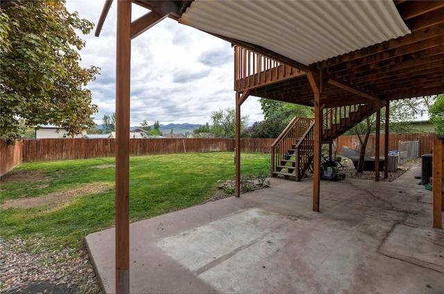 view of patio / terrace featuring a wooden deck