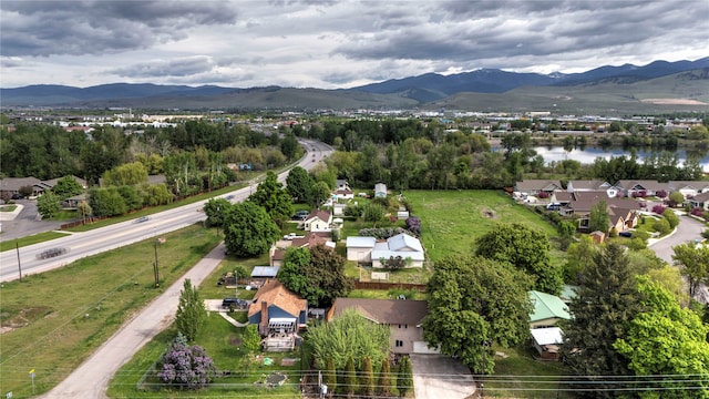 birds eye view of property with a mountain view