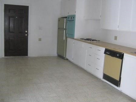 kitchen with wall oven, white cabinetry, dishwashing machine, white refrigerator, and gas cooktop