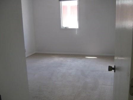 empty room featuring carpet