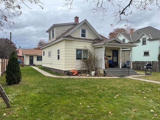 bungalow with a front yard