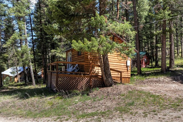 283 Lost Trail Hot Springs Rd, Sula, MT 59871 - view of property exterior featuring a wooden deck