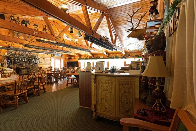 283 Lost Trail Hot Springs Rd, Sula, MT 59871 - interior space with lofted ceiling with beams, carpet floors, and wooden ceiling