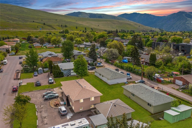 aerial view at dusk with a mountain view