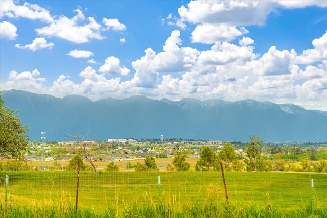 mountain view featuring a rural view