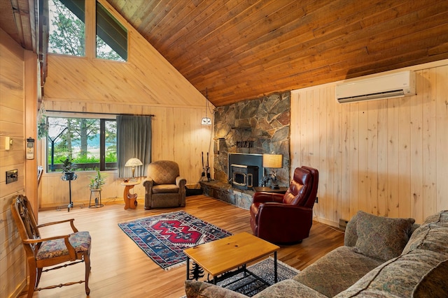 living room featuring an AC wall unit, wood walls, hardwood / wood-style flooring, and wooden ceiling