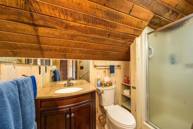 bathroom with vaulted ceiling, vanity with extensive cabinet space, toilet, wood ceiling, and walk in shower