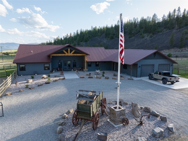 view of front of property with a garage