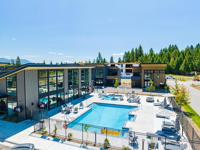 view of swimming pool featuring a patio area