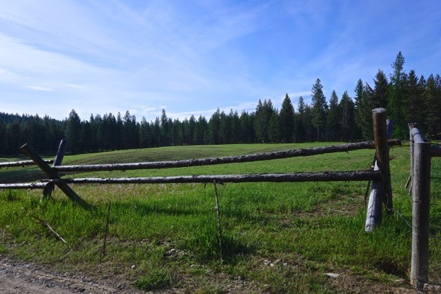 exterior space with a yard and a rural view