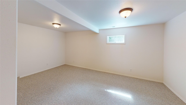 empty room featuring carpet floors