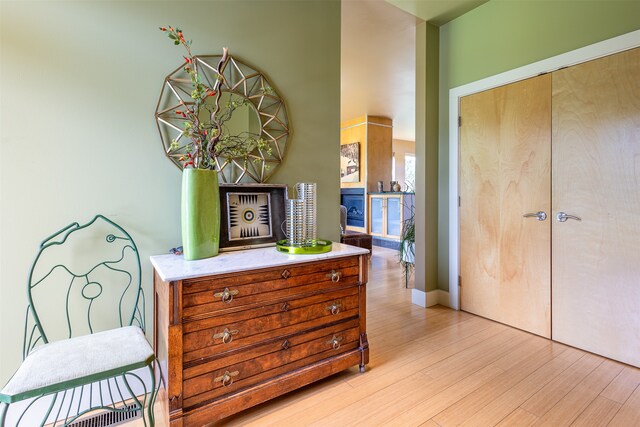 bedroom featuring light hardwood / wood-style floors and a closet