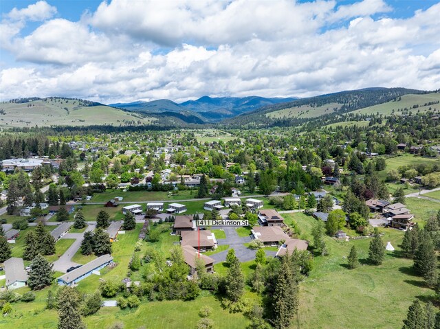 birds eye view of property featuring a mountain view