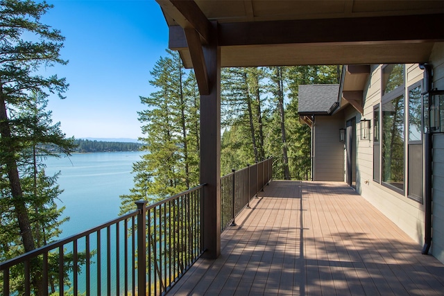 198 Blaine Lakeshore Dr, Kalispell, MT 59901 - wooden terrace with a water view