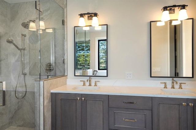 198 Blaine Lakeshore Dr, Kalispell, MT 59901 - bathroom featuring a shower stall, double vanity, and a sink