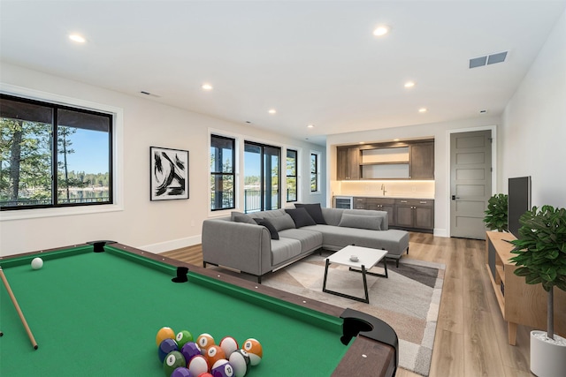 198 Blaine Lakeshore Dr, Kalispell, MT 59901 - playroom featuring visible vents, billiards, light wood-type flooring, and recessed lighting
