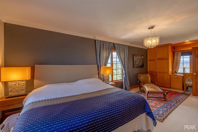 bedroom with crown molding, carpet flooring, and an inviting chandelier