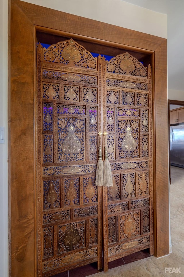 interior details featuring stainless steel refrigerator