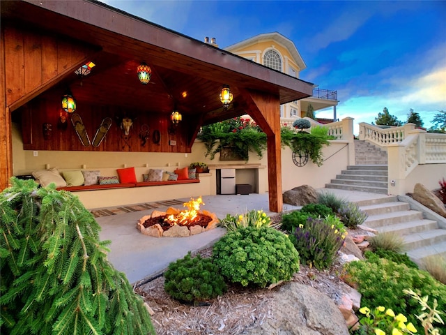 exterior space featuring a fire pit